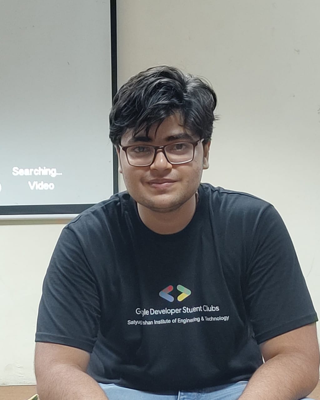 Chirag wearing a google developer student club tshirt looking at you